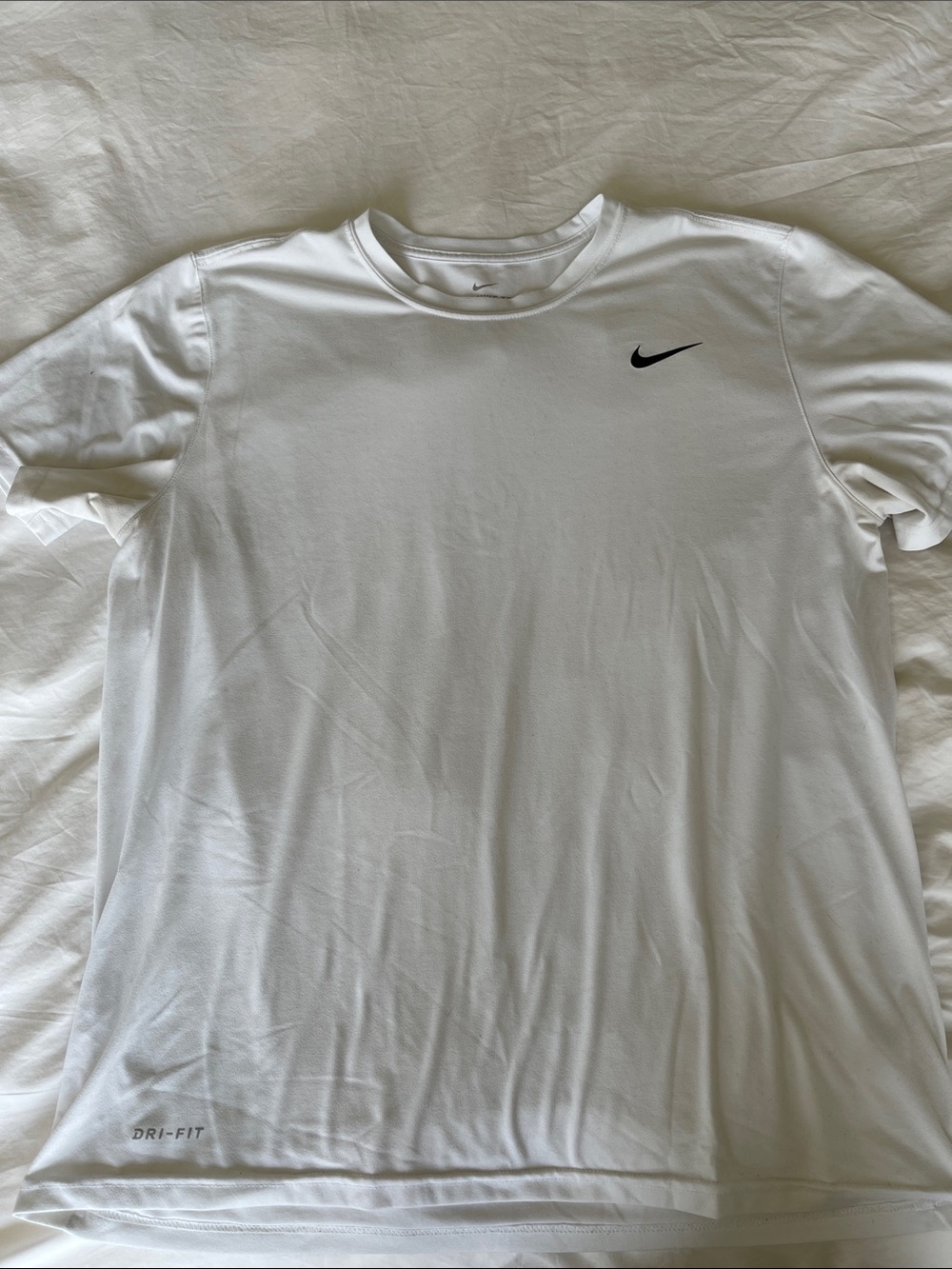 Nike White Short-Sleeve Dri-FIT Performance Tee with Black Swoosh
